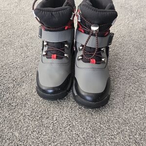 Gray and Black Winter Boots with Red Accents